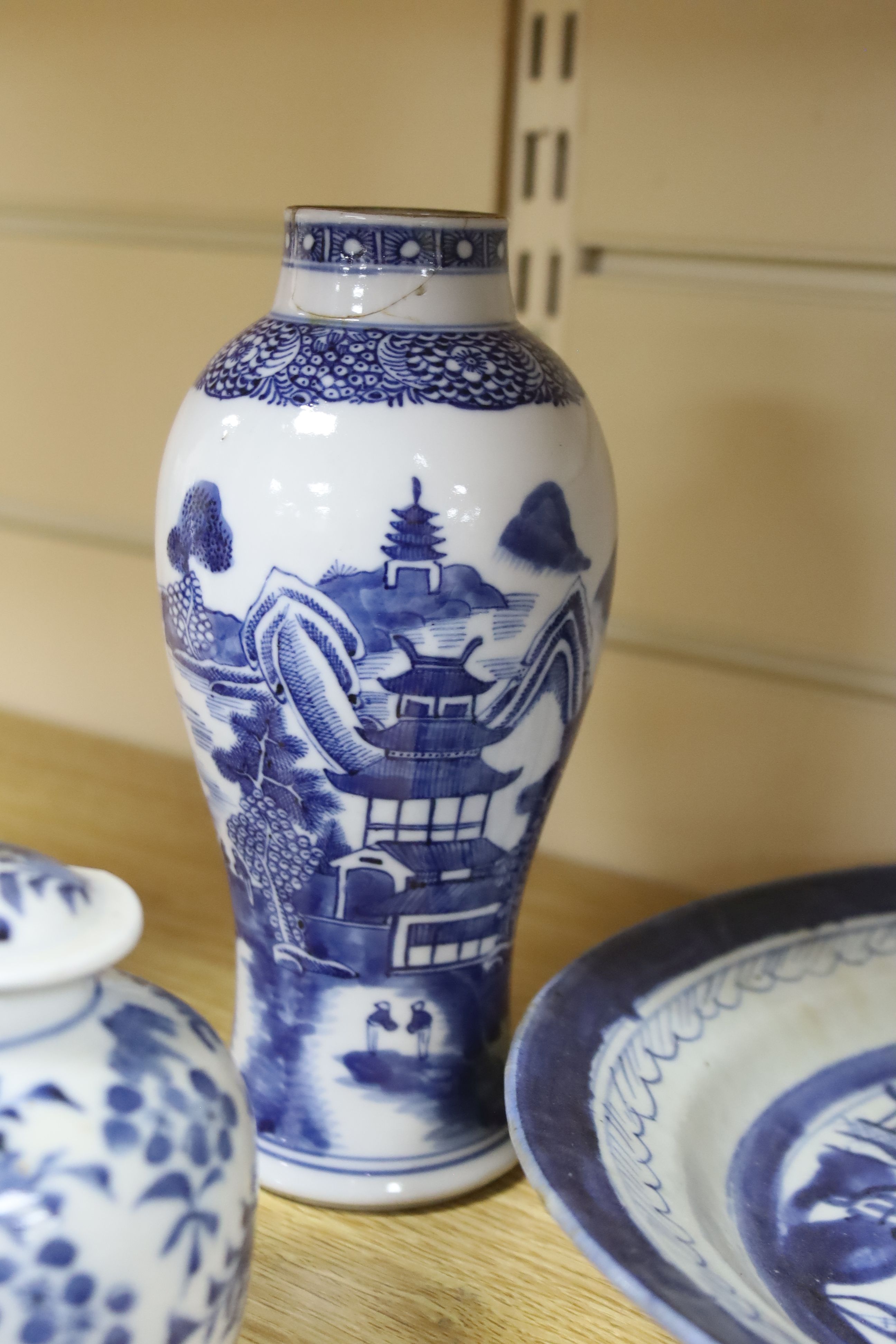 A group of Chinese blue and white vases and plates, 18th century/ 19th and a Japanese shaped dish